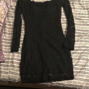 Off the shoulder, semi sparkly little black dress